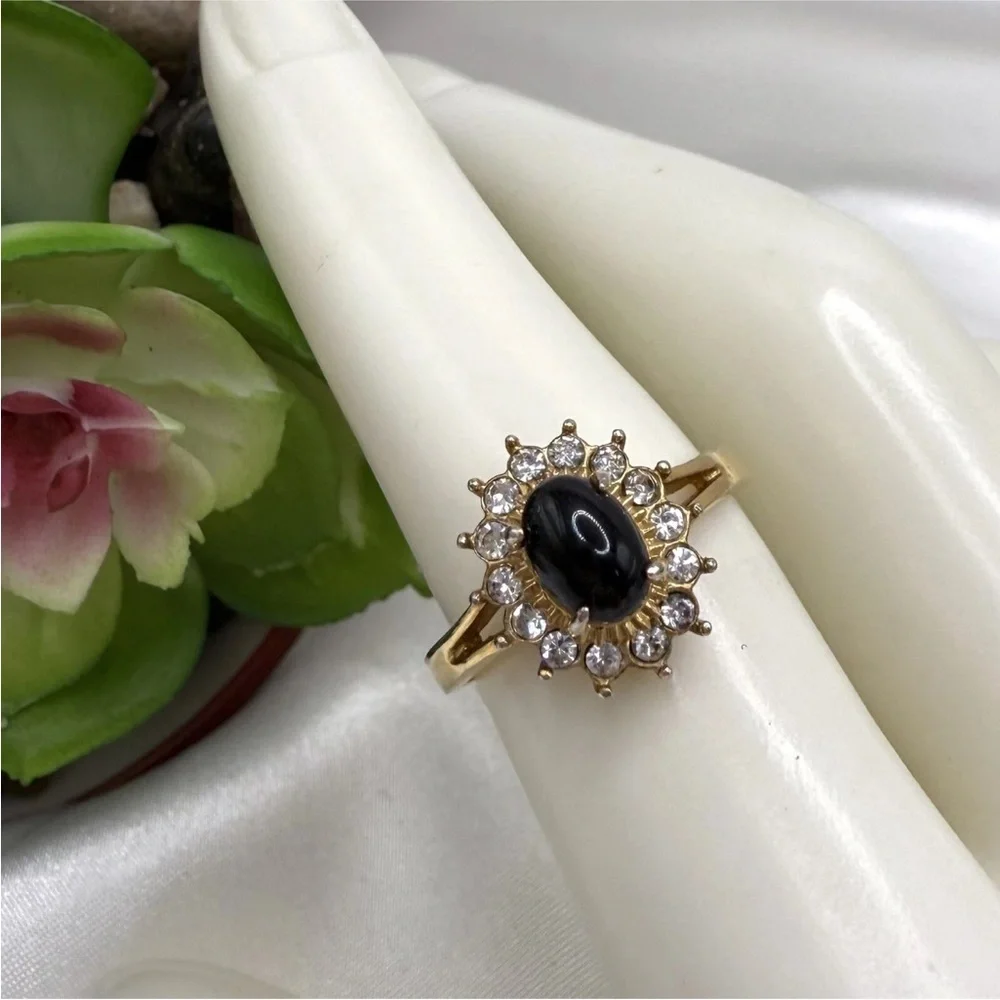 18K Gold Ring with Black Center Stone and Clear Accent Stones